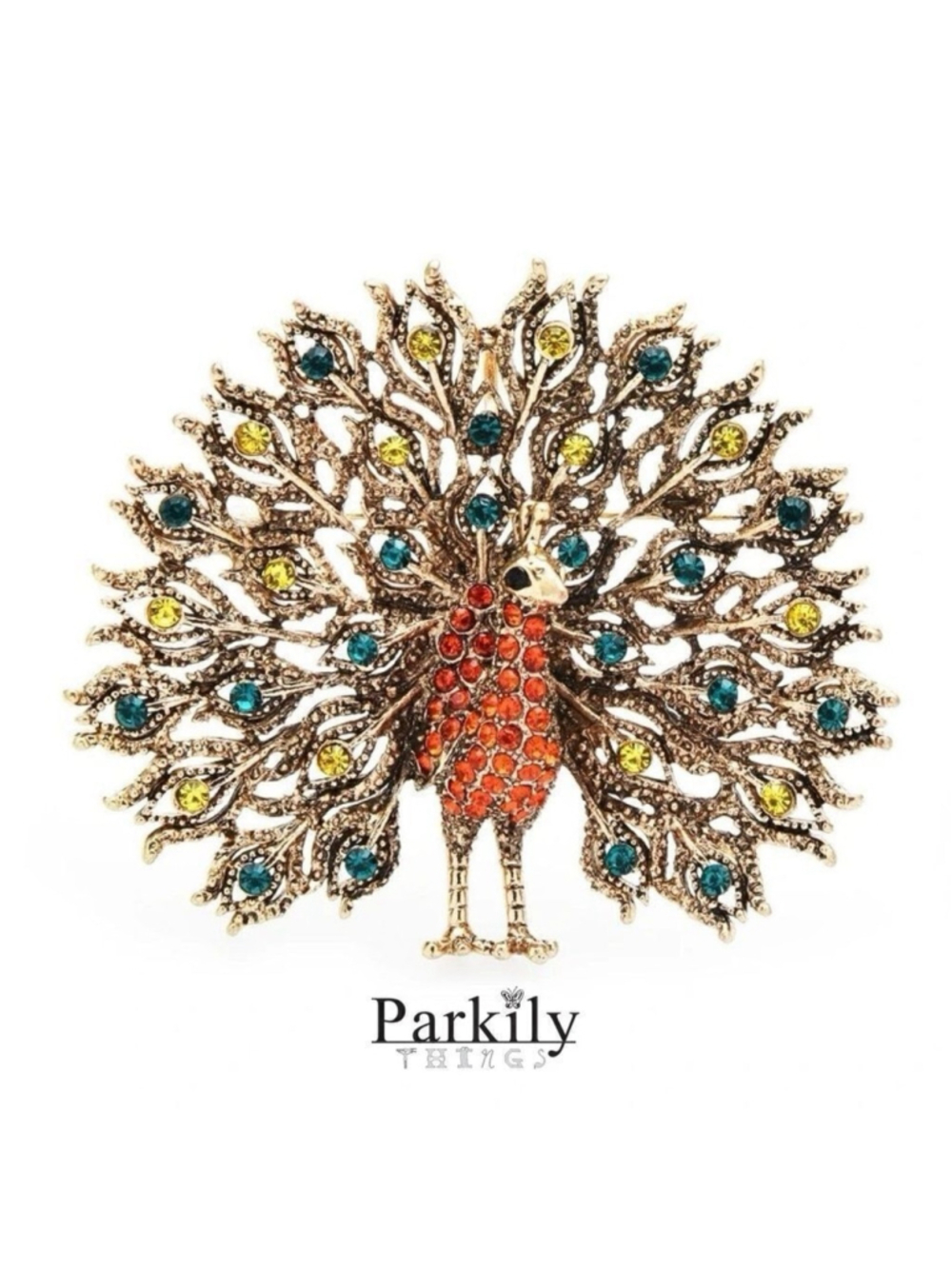 Brooch peacock in red with yellow and blue/green crystals in a gold tone pin
